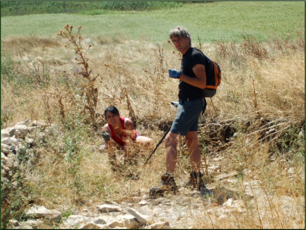 Fig. 3: Amateur metal-detector looters at ancient Argamum, Romania